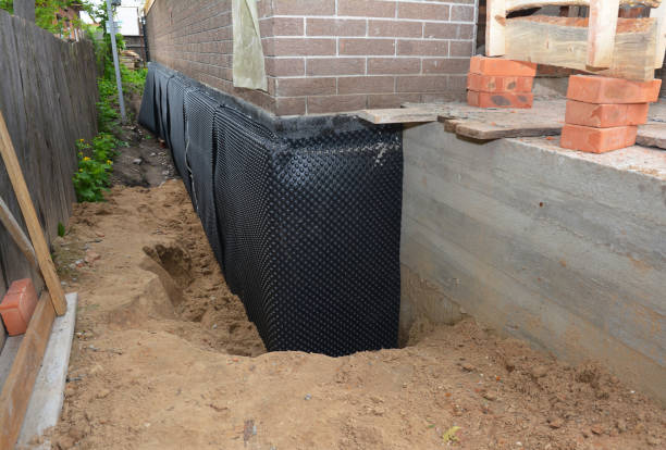 Happy homeowners after waterproofing job in South Butler